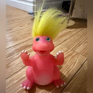 90s “Dino Cuties” Pink Dinosaur Toy with Yellow Hair